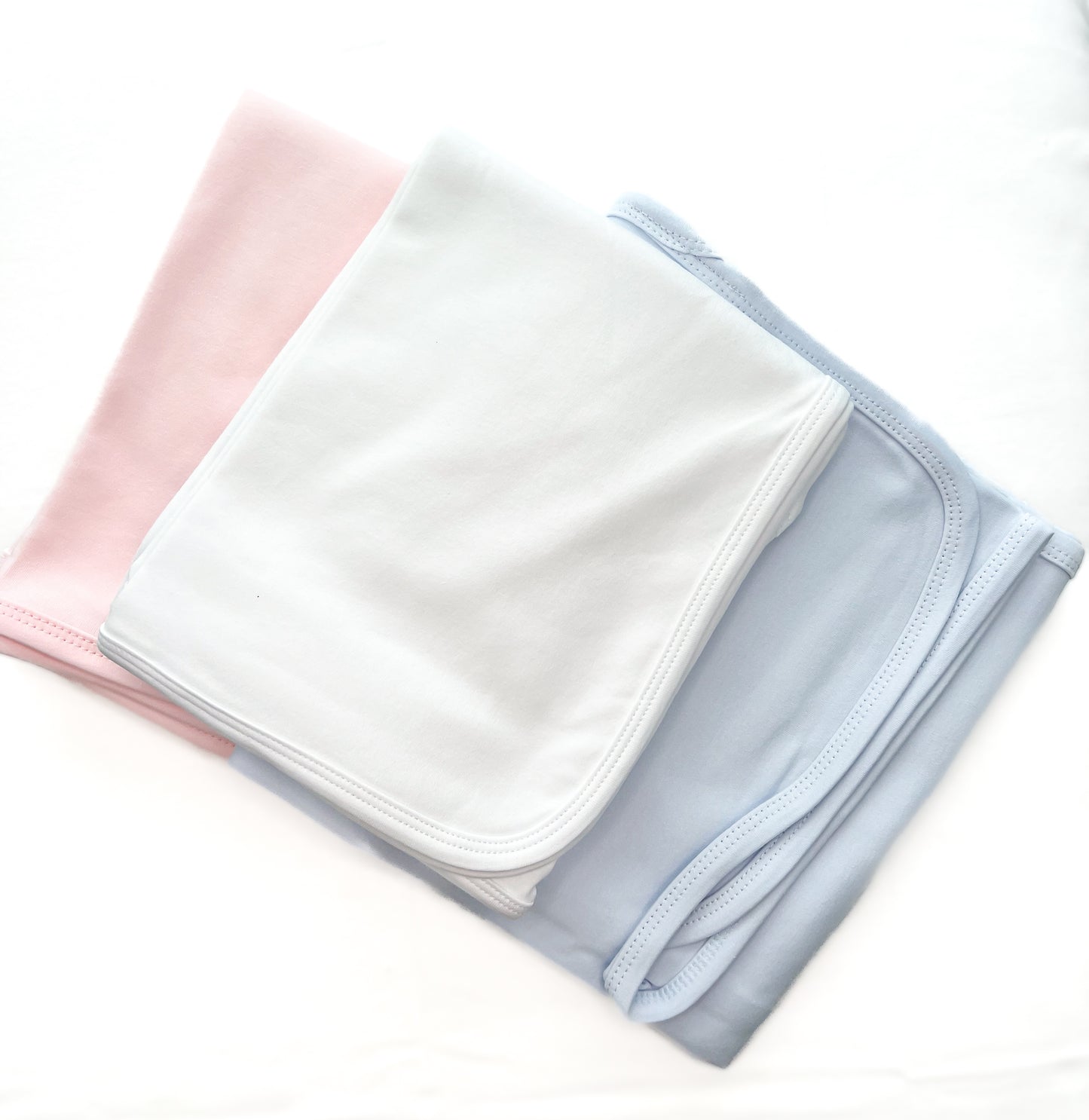 Personalized and monogrammed baby burp cloths.